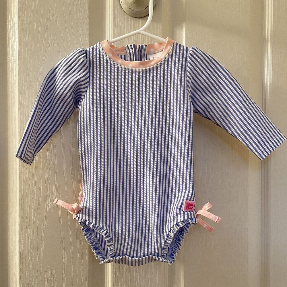 RuffleButts Seersucker One Piece Rash Guard Swimsuit Blue Pink Size 6-12 Months